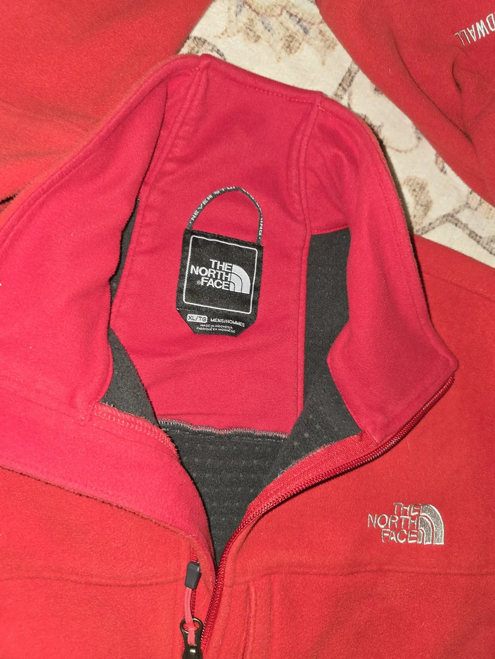 The North Face Wind Wall Red Fleece Jacket.